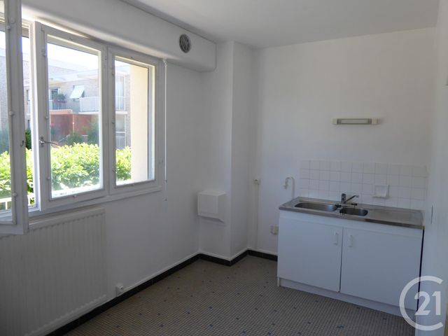 Afficher la photo en grand Appartement F3 à louer - 3 pièces - 66.04 m2 - DOLE - 39 - FRANCHE-COMTE - Century 21 Cabinet Faivre